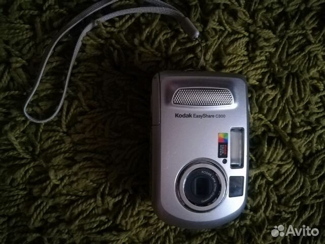 Фотоаппарат и плейер начала 2000х