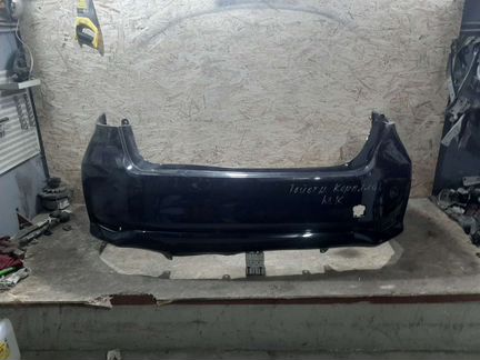 Бампер задний Toyota Corolla E210
