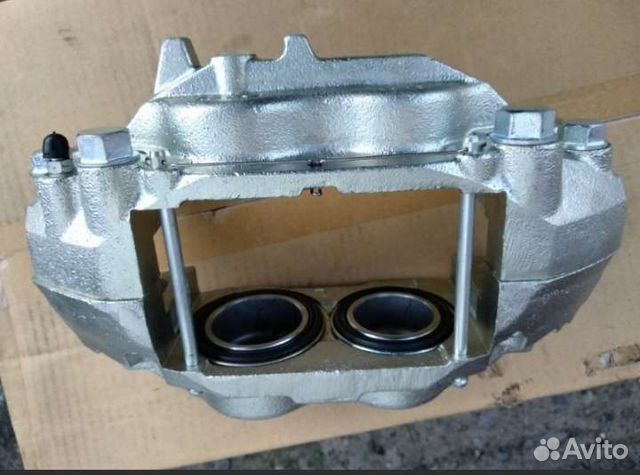 Суппорт левый передний Nissan Patrol Y62