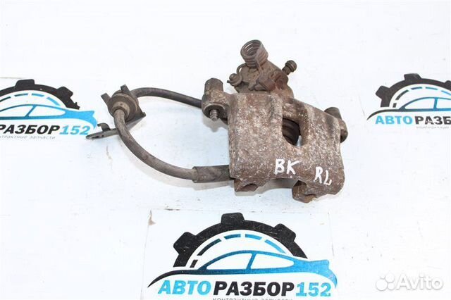 Суппорт тормозной задний левый Mazda 3 BK LF