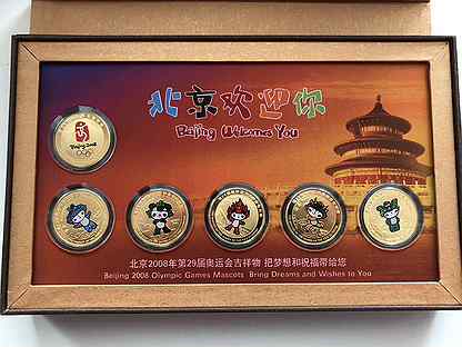 Жетоны-медали символы Пекинской Олимпиады 2008