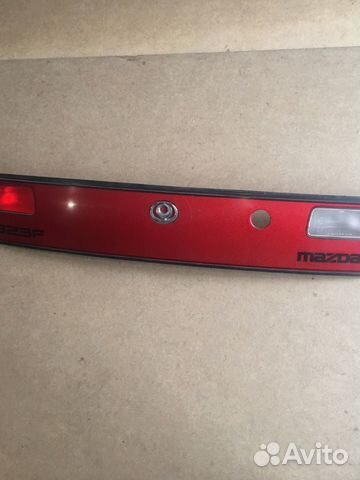 Накладка двери багажника Mazda 323 BA
