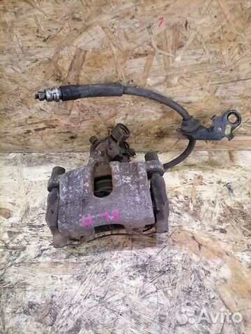 Тормозной суппорт задний правый Mazda 3 BL