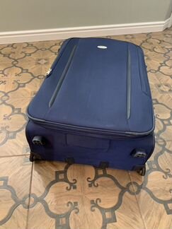 Чемодан на колесах samsonite