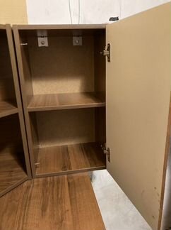 Угловой навесной шкаф